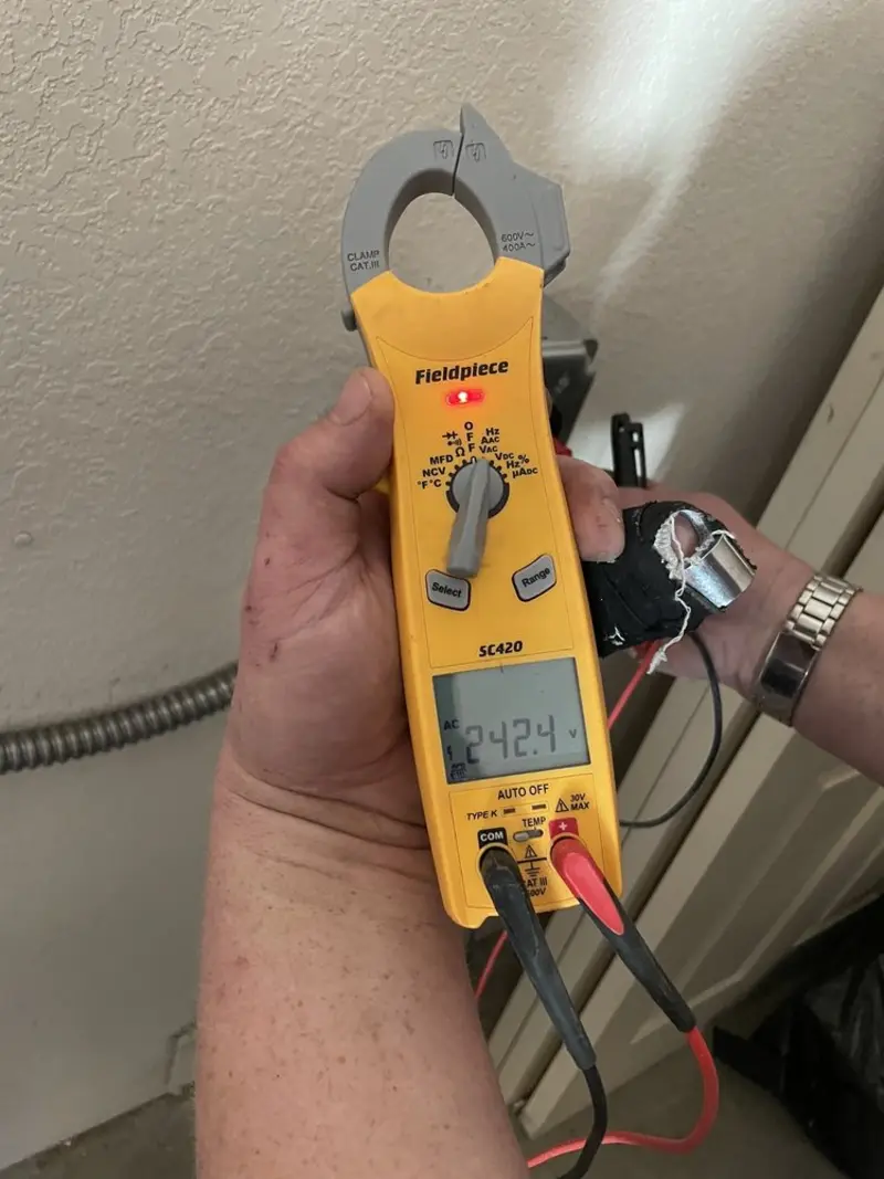 Voltage testing with clamp meter during Generator Installation in Caro